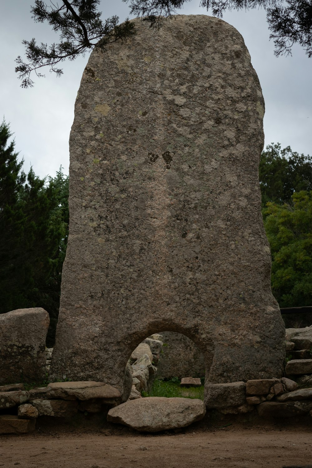 a large rock with a hole in the middle of it