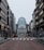 a city street lined with tall buildings