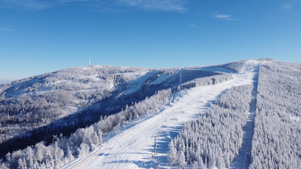 a view of a ski slope from the top of a mountain