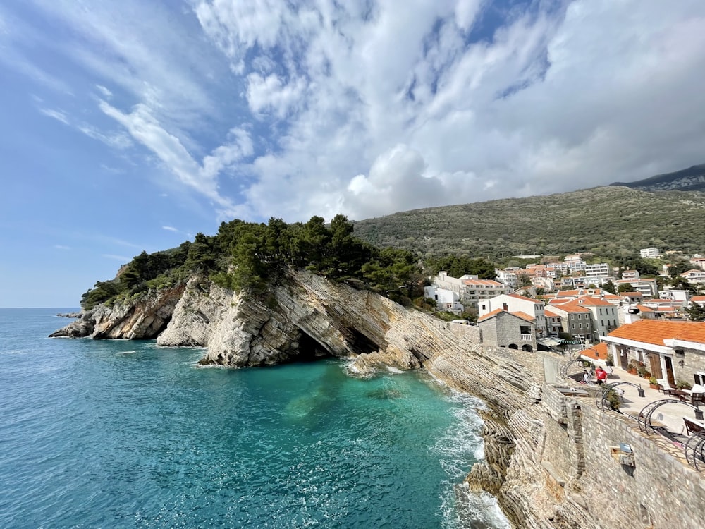 a beach with a small island in the middle of it