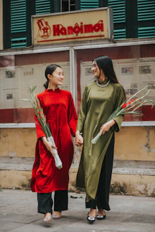a couple of women standing next to each other