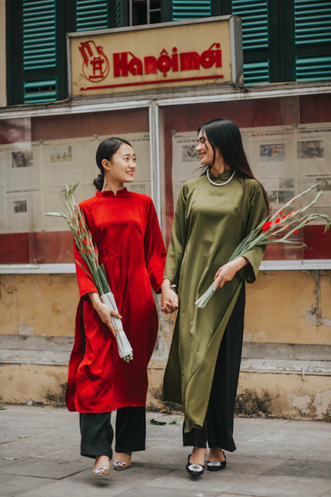 a couple of women standing next to each other