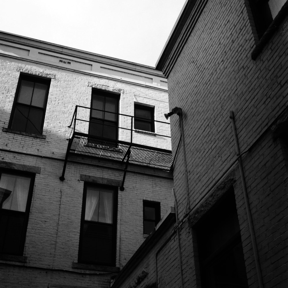 a black and white photo of a brick building