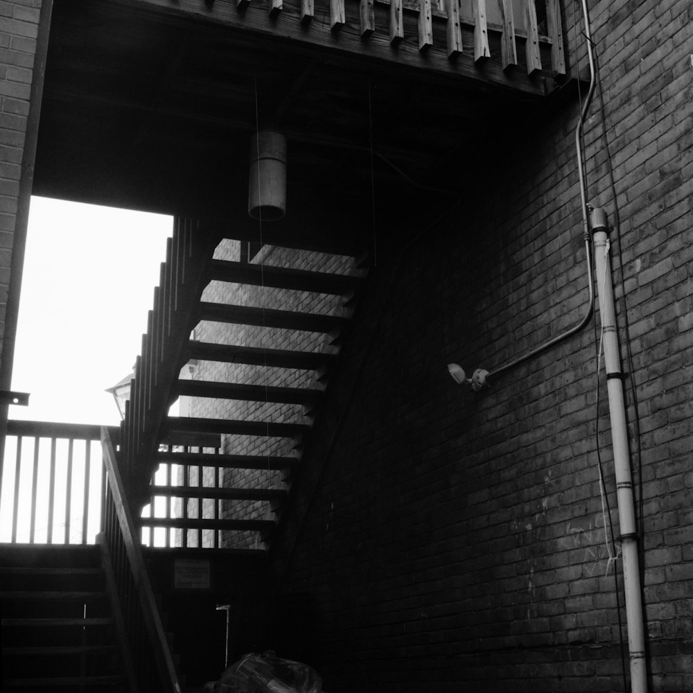 a staircase leading up to a brick building