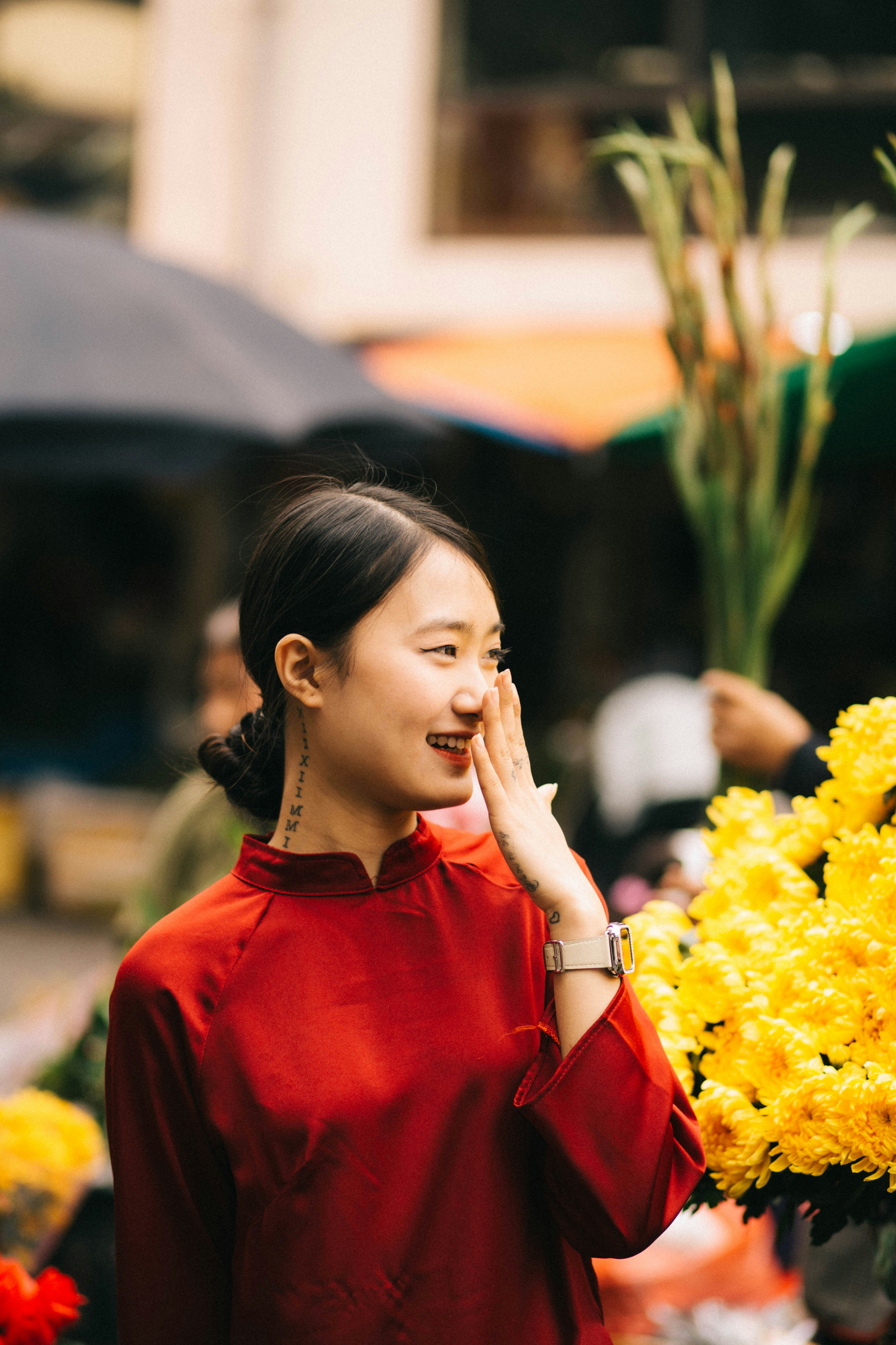 Mei-Ling, woman with bright smile, warm-toned portrait