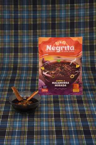 Close-up of a colorful package from Velaco Perú just delivered on a doorstep.