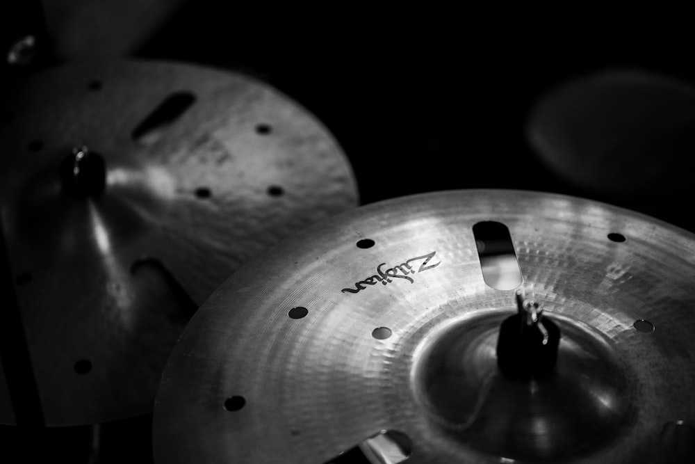 a black and white photo of a set of drums
