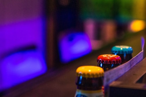 A photo showing combined bottle caps and labels ready for processing.