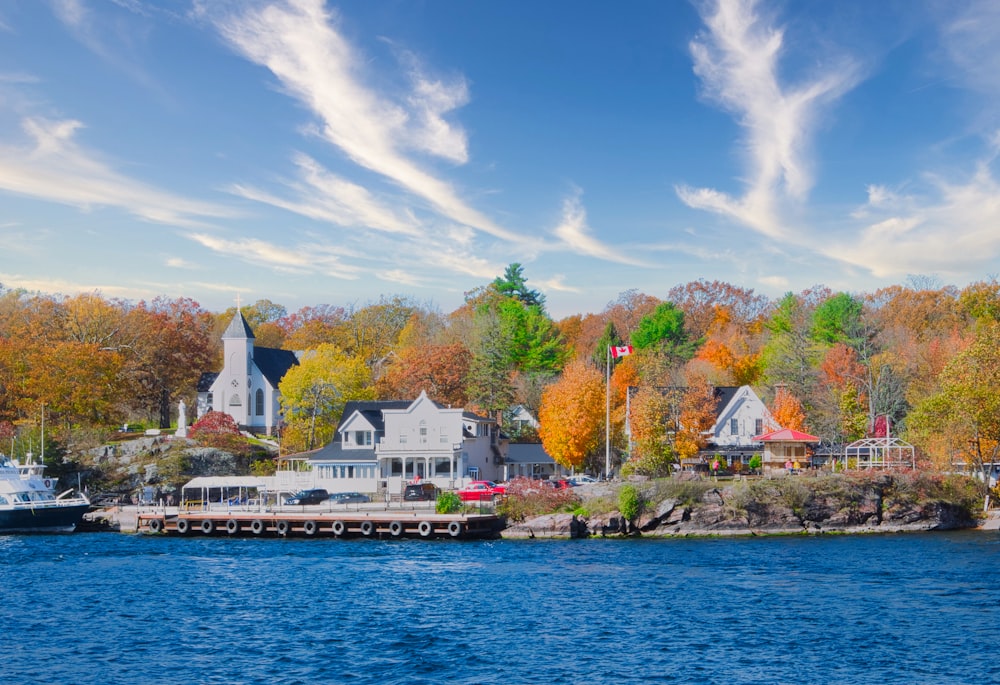 a large body of water surrounded by trees