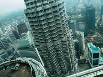 High-rise building with city skyline in the background