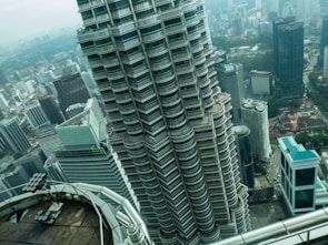 View of the Pinnacle building exterior with Paraguayan cityscape in the background