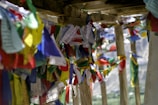 A vibrant display of handcrafted prayer flags fluttering in the wind.