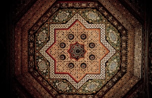 A richly textured canvas depicting intertwined European and North African sacred symbols in deep earth tones.