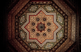 A richly textured canvas depicting intertwined European and North African sacred symbols in deep earth tones.