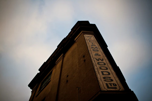 Exterior shot of Seivewright Repairs shop front with a bold, industrial look under soft evening light.