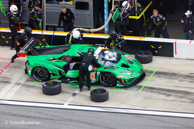 Exciting live pit stop action showcasing teamwork and cutting-edge technology