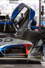 A detailed CFD simulation showing airflow over a racing car in vibrant colors.