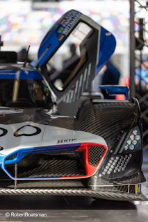 Side view of the monocoque construction of an xcalion alma carbon racket emphasizing its sleek design