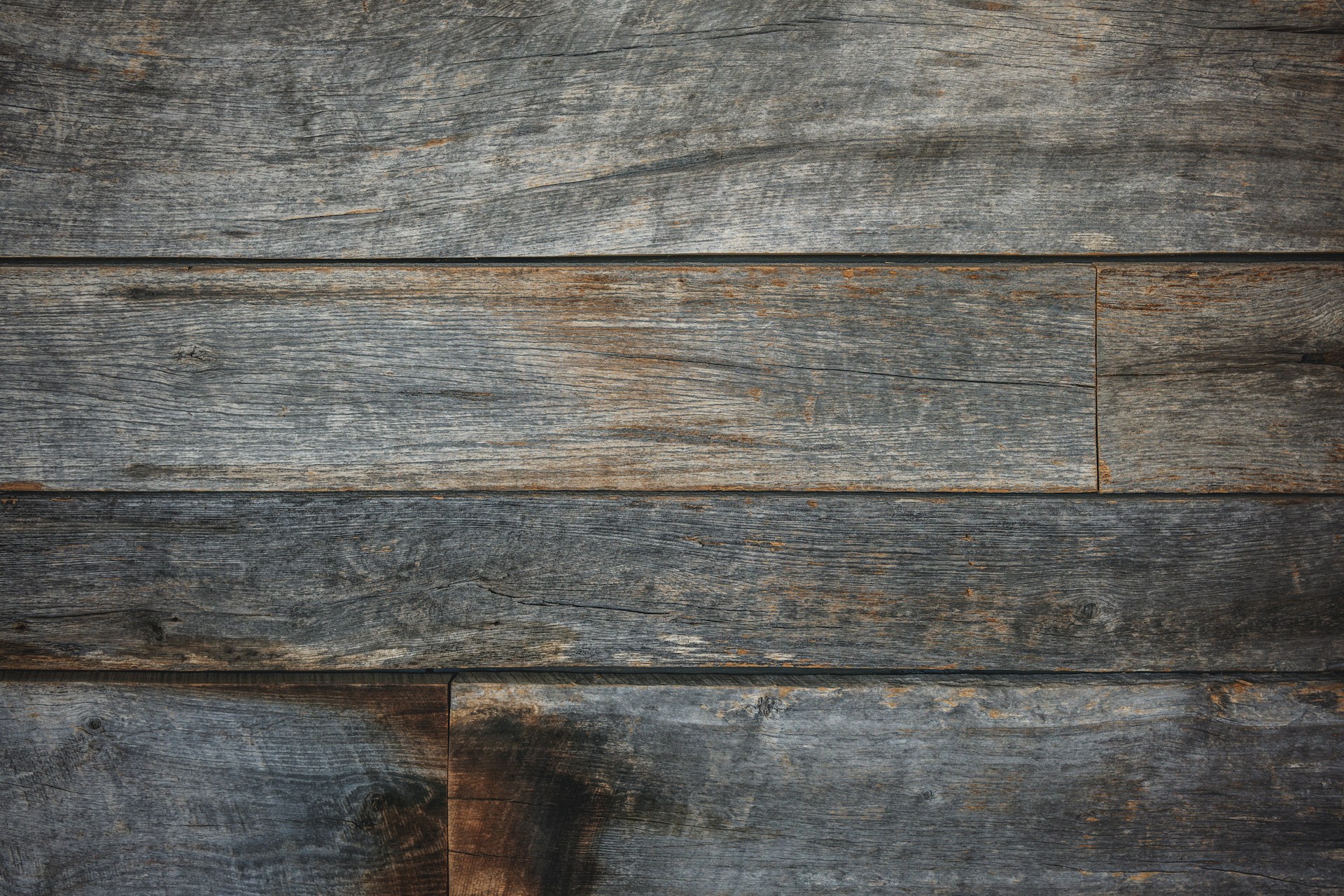 a close up of a piece of wood with peeling paint