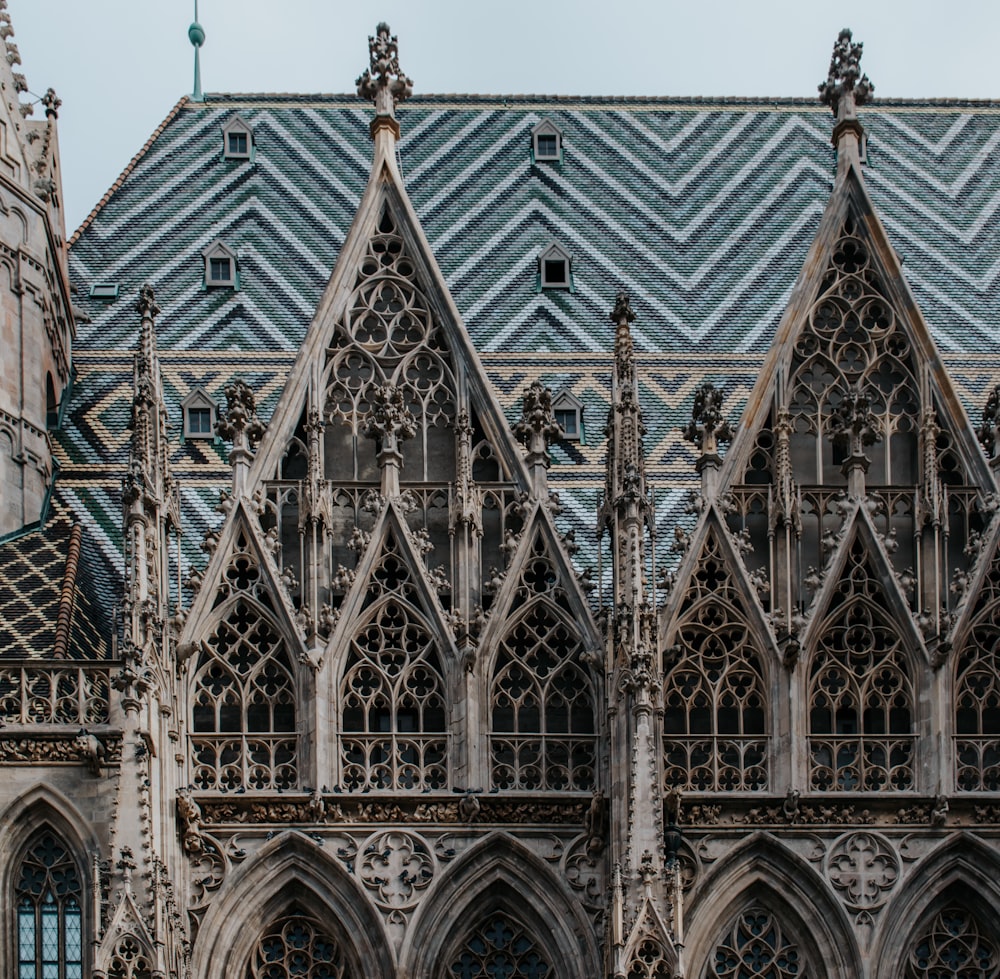 a large cathedral with a clock on the front of it