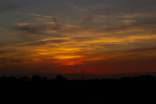 A vibrant sunset symbolizing hope and new beginnings.