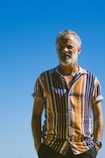 a man standing with his hands in his pockets