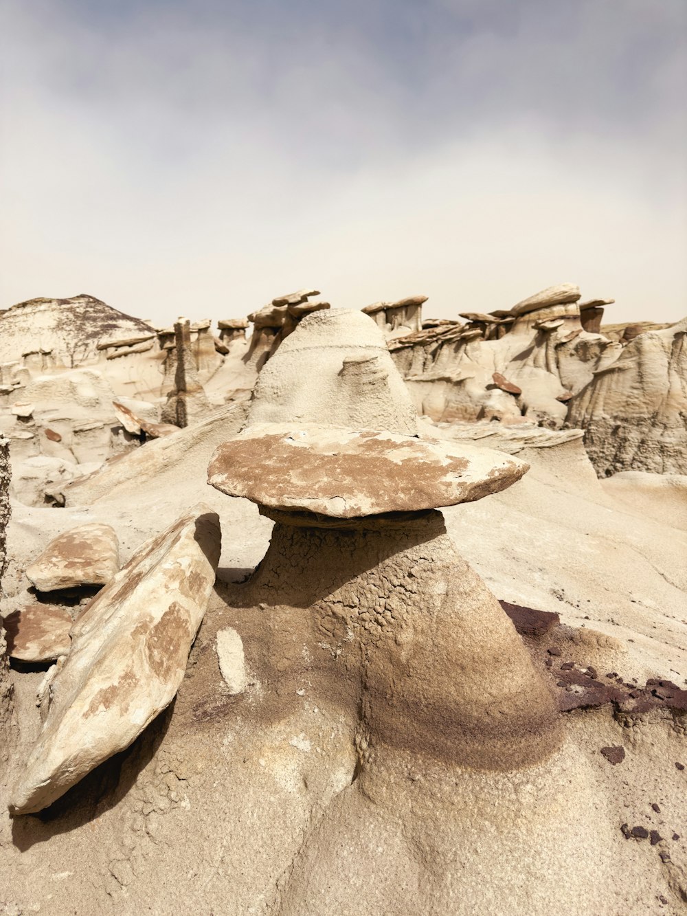 a rock formation with a surfboard on top of it