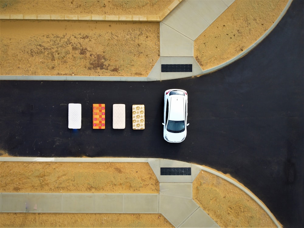 a car is parked on a paved road