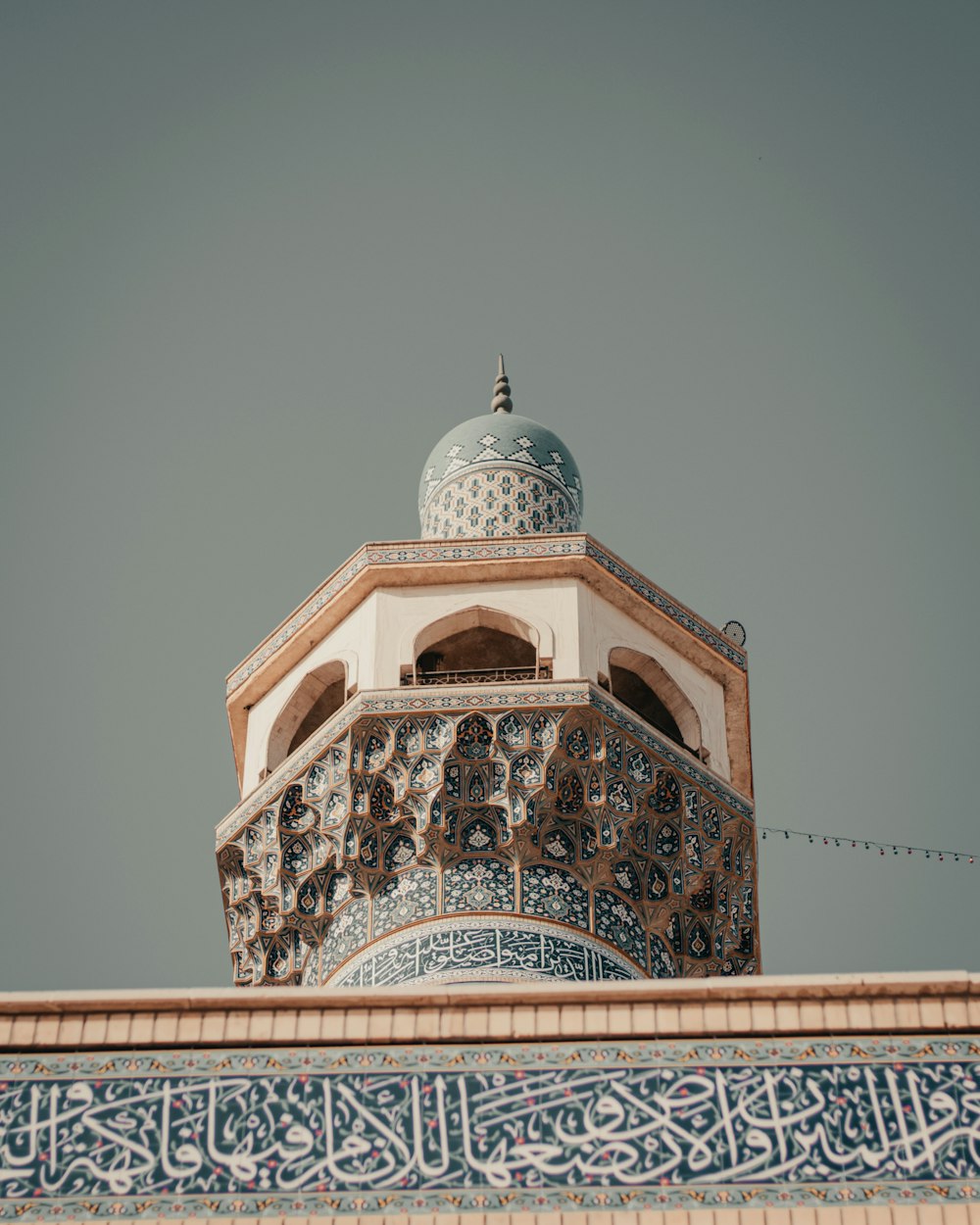 a dome on top of a building with a sky background