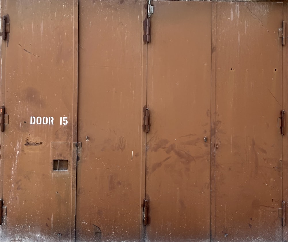 a brown door with a door 15 written on it