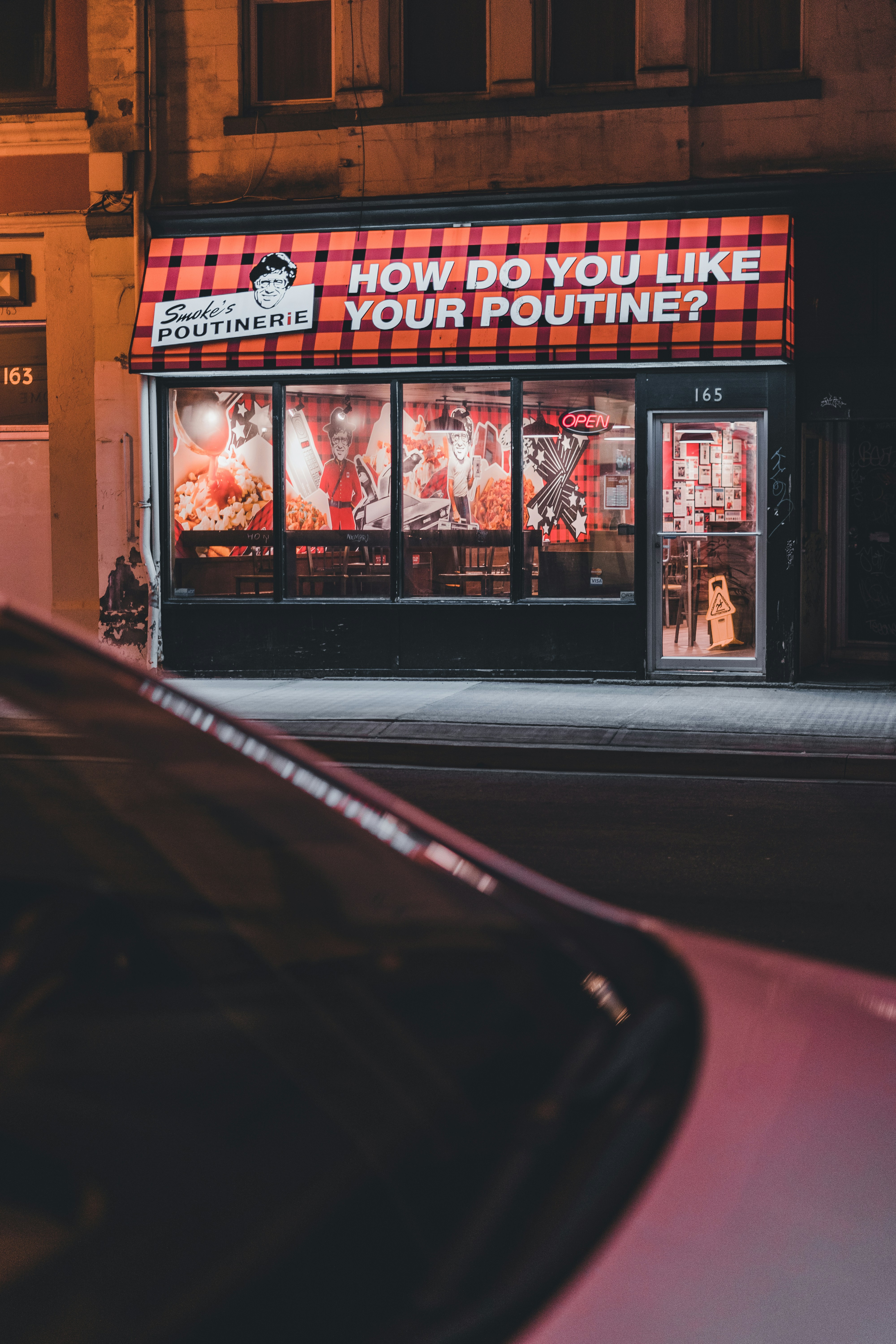 a car parked in front of a store