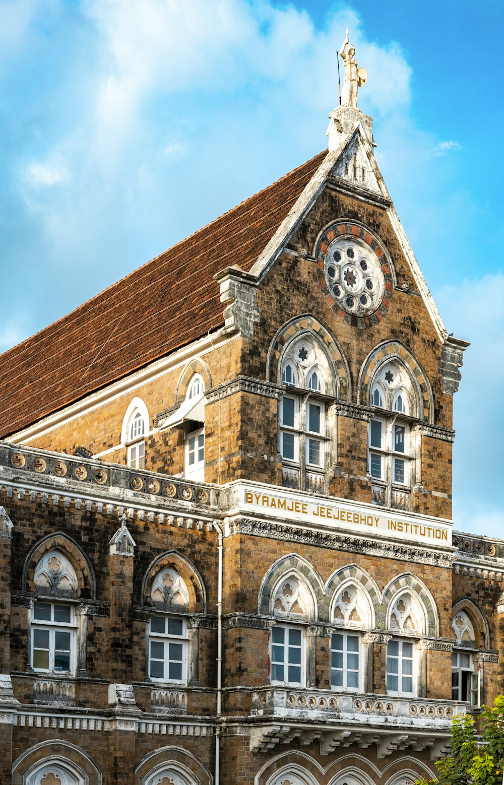 a large building with a clock on the top of it