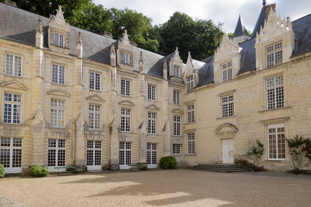 a large stone building with a lot of windows