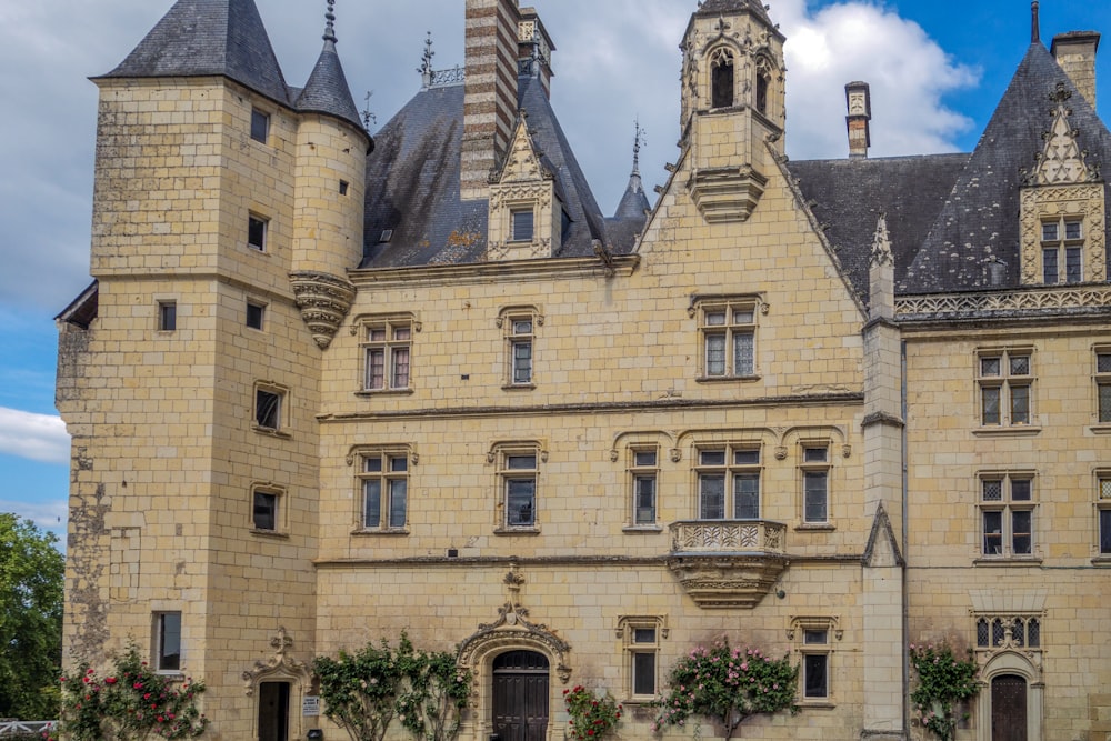 a large castle like building with a clock tower