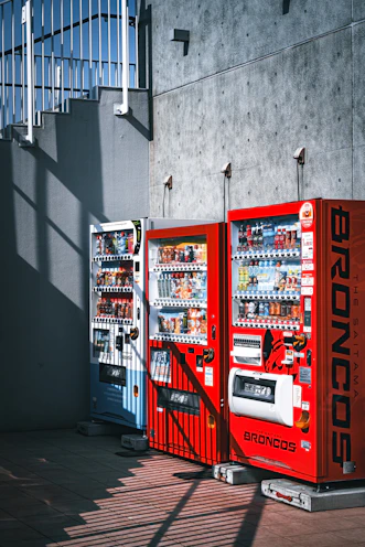 a row of vending machines sitting next to each other