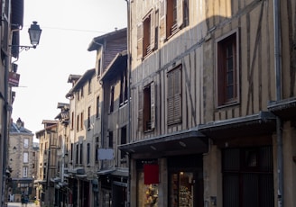 a cobblestone street lined with old buildings