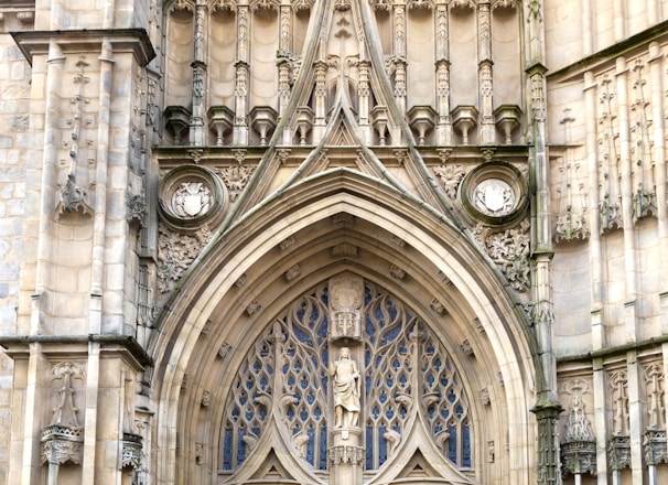 a large stone building with two large doors