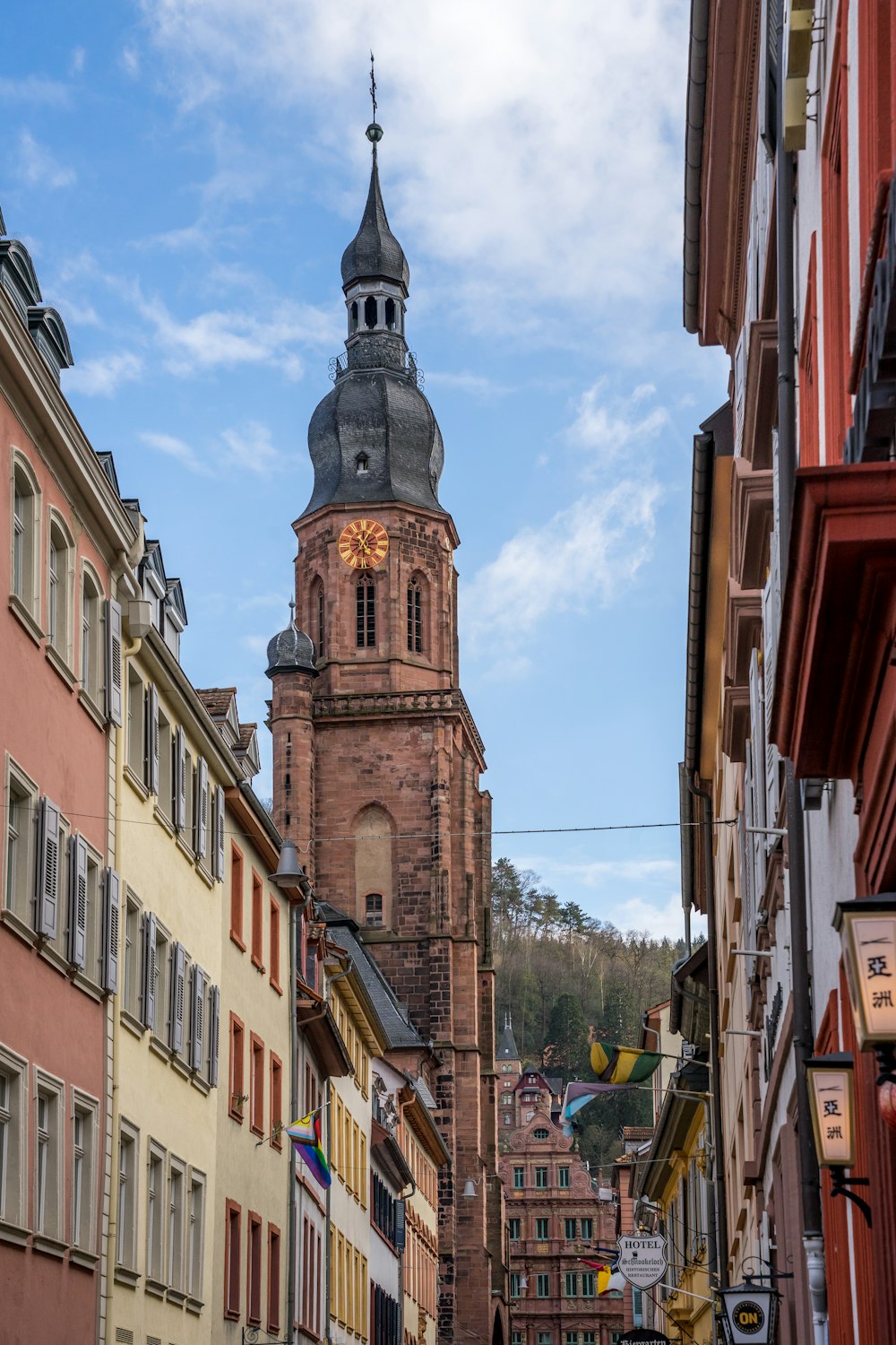 a tall clock tower towering over a city