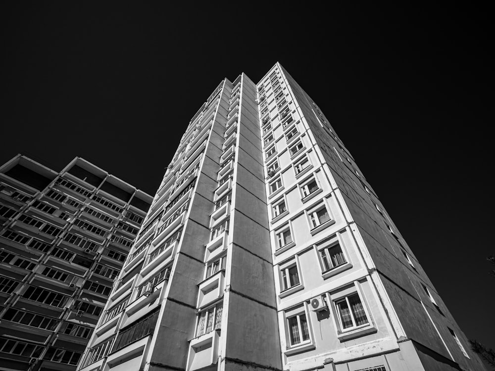 a black and white photo of a tall building