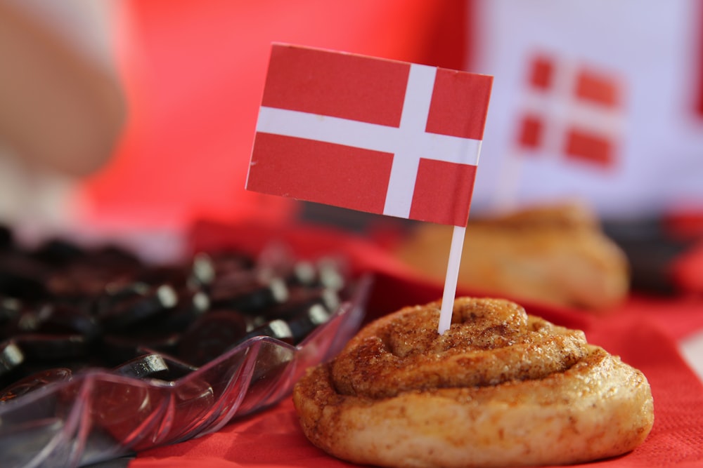 a pastry with a flag sticking out of it