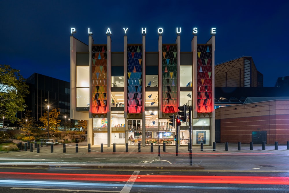 a building with a sign that says play house on it
