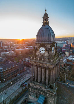a large building with a clock on the top of it