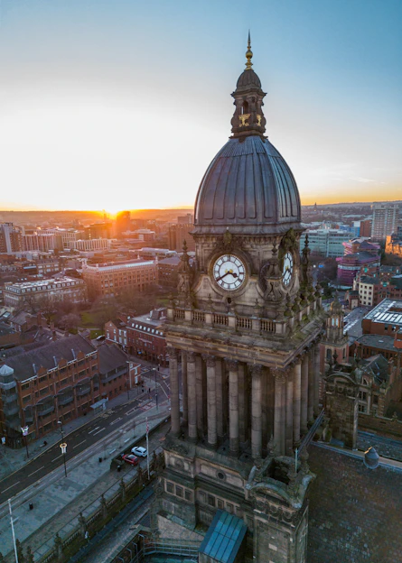 a large building with a clock on the top of it
