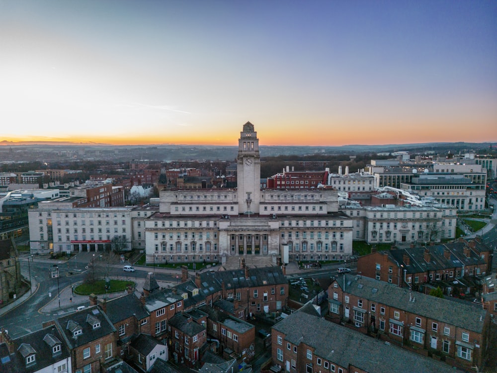 an aerial view of a city with a clock tower