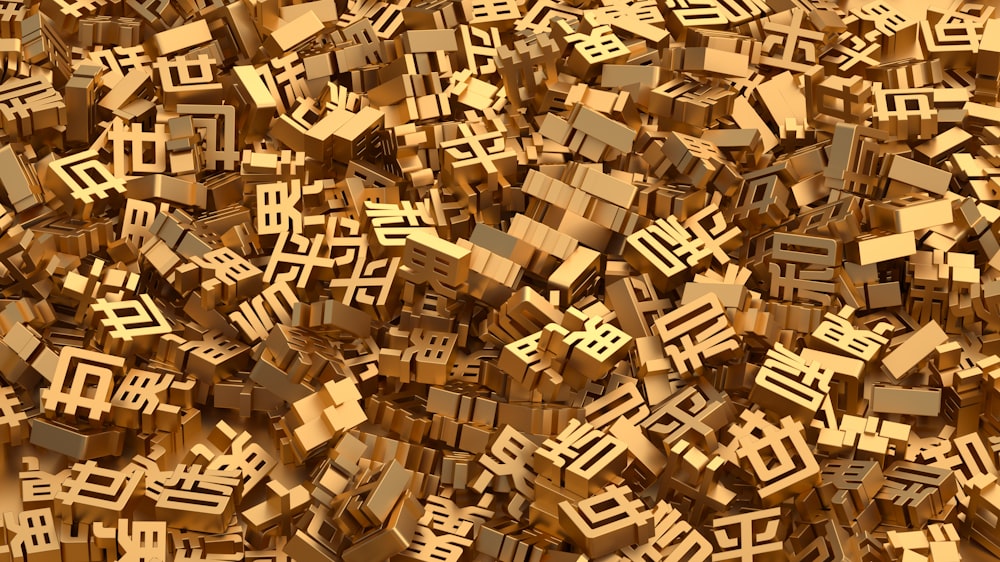 a large pile of wooden blocks with chinese characters on them