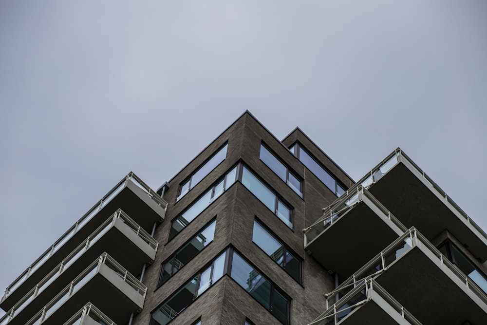 a tall building with balconies and balconies on the side