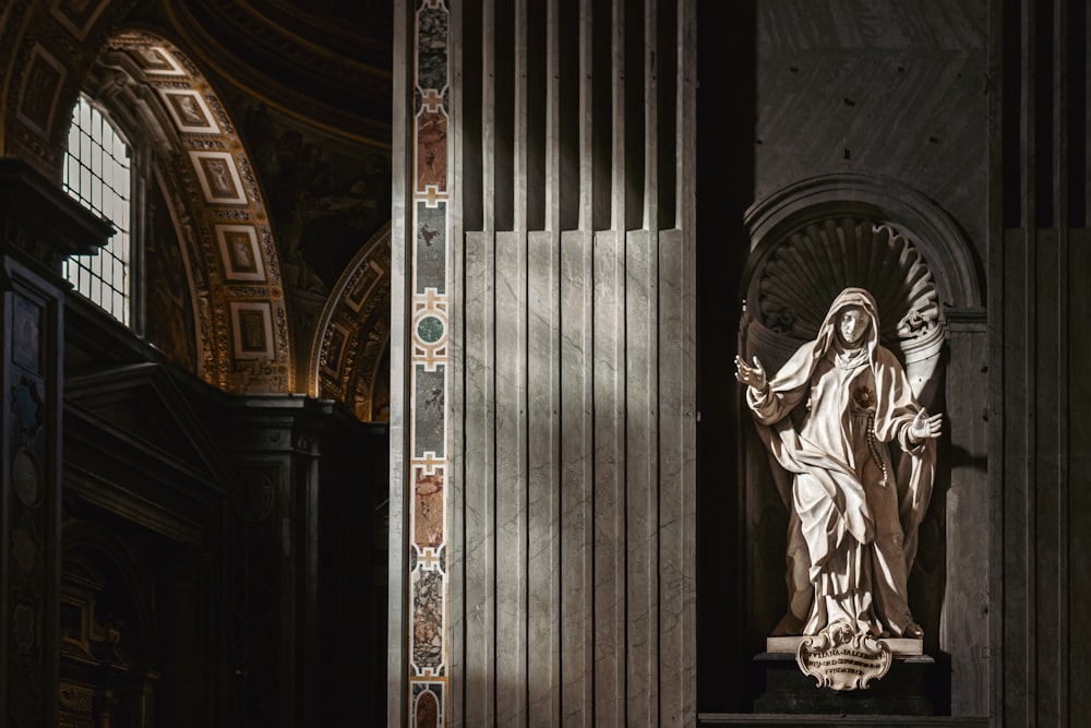 a statue of a person in a church