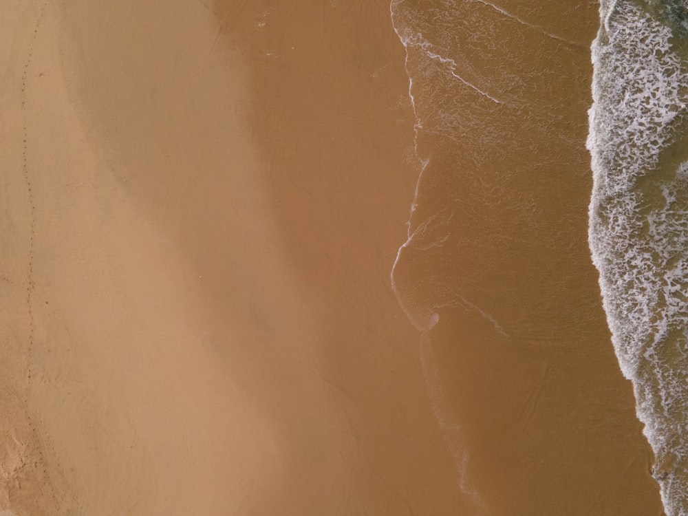 a bird's eye view of a sandy beach