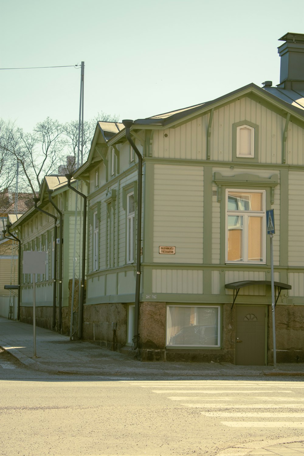 a building on the corner of a street