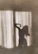 An elegant silhouette of a woman in soft shadows, embodying grace and mystery.